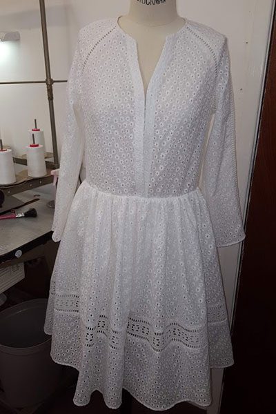 Broderie dress on the stand